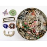 A collection of costume jewellery to include vintage paste set clip on earrings, necklaces, glass