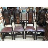 A set of four Victorian oak high backed dining chairs, in the Carolean style (4)