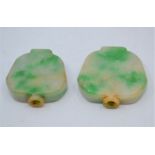 A pair of Chinese pale and apple-green splashed jadeite snuff bottles, probably 19th Century, of