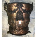 A parcel gilt embossed copper and bronze mounted coal bin (distressed)