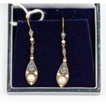 A pair of sapphire and pearl silver gilt  drop earrings, compromising a large navette shaped drop