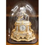 A late 19th Century gold gilt mantle clock with figure of man and horse by Coulson, French in