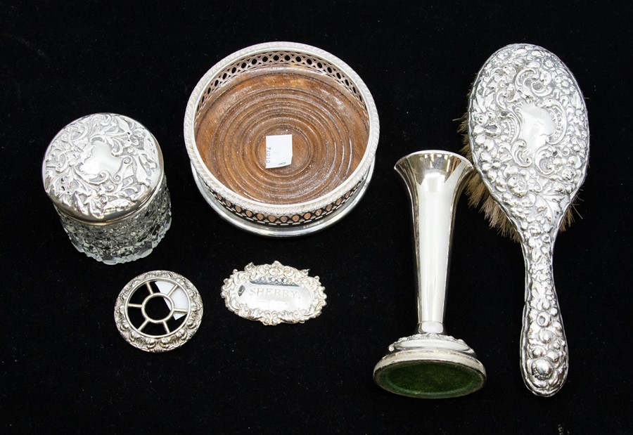 A group of silver to include silver mounted hairbrush, toilet bottle and silver cover and Modern