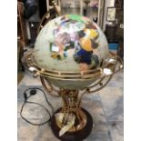 A resin and brass table globe (AF)