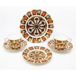 Royal Crown Derby fan plate, pattern 1128, side plate 1128 and two tea cups with saucers, first