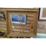 A late Victorian gilded gesso edged picture frame, fitting a painting of approx 37cms x 44.5cms,