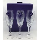 Collection of Edinburgh crystal glasses in boxes.