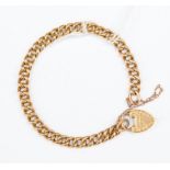 A 15ct Victorian Albert link chain bracelet, with padlock clasp, length approx. 20cm, with safety