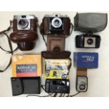 A collection of cameras to include Kodak and Zeiss, circa mid to late 20th Century