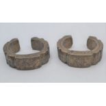 A pair of late 19th Century to early 20th Century slave/money bangles, probably made from bronze