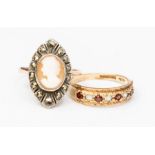 A 9ct rose gold and silver cameo ring set, the marquise shaped mount with oval cameo to the centre