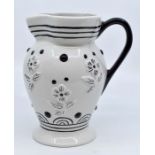 Lorna Bailey- jug by Shorter, white ground with black handle and floral decoration, signed to