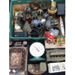 A collection of miscellaneous items including scales, Post Office scales, clocks, cameras, writing