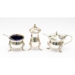 An Elizabeth II three piece silver cruet set, Birmingham 1958, comprising mustard pot, salt cellar
