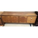 A Nathan Circles teak sideboard, circa 1975, fitted with two doors to centre, a fold down door to