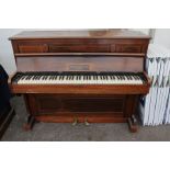 A John Broadwood and Sons of London upright piano, early 20th Century, in rosewood veneer, having