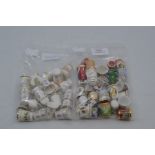 Thimbles; a collection of assorted Calendar and Year thimbles, transfer printed, (approx 25),