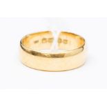 An 18ct gold wedding band, 5mm wide, court section,  size V1/2, weight approx. 8gms