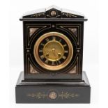 A French black marble mantel clock, circa 1900, of architectural form and etched with flower