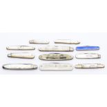 An assembled group of eleven Edwardian and later pocket knives, mostly mother-of-pearl cased, one