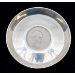 A modern silver United Kingdom Coinage Memorabilia dish inset with Winston Churchill / HM Queen