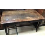 A 19th Century joined oak kitchen table with plank top, square supports, 67cm high, 138cm long, 70cm