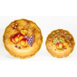 Two Royal Worcester hand painted cabinet plates, comprising large plated painted with a fruit