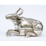 An Asian white metal box and cover cast in the form of a recumbent Cow, stamped 790, gross weight