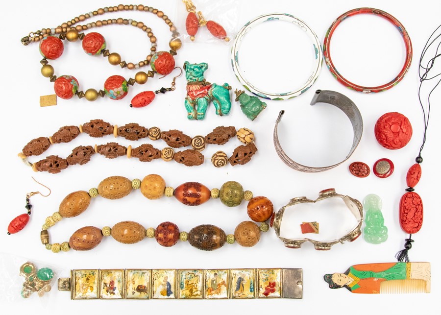 A collection of Oriental/ethnic themed items to include costume jewellery, a panel link bracelet,