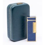 A cased Dunhill cigarette lighter, circa 3rd quarter 20th Century, in yellow metal with lapis lazuli