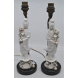 A pair of blanc de Chine figures converted to table lamps
