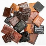 Twenty various recent and vintage gentleman's crocodile wallets, including a Dunhill example. (20)