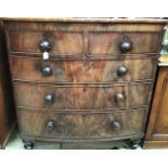 A 19th Century mahogany bow fronted chest of drawers, two over three with knob handles, 115cm