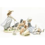 Lladro: large Lladro figure of lady walking dogs, girl feeding ducks and two dogs. No boxes bapart