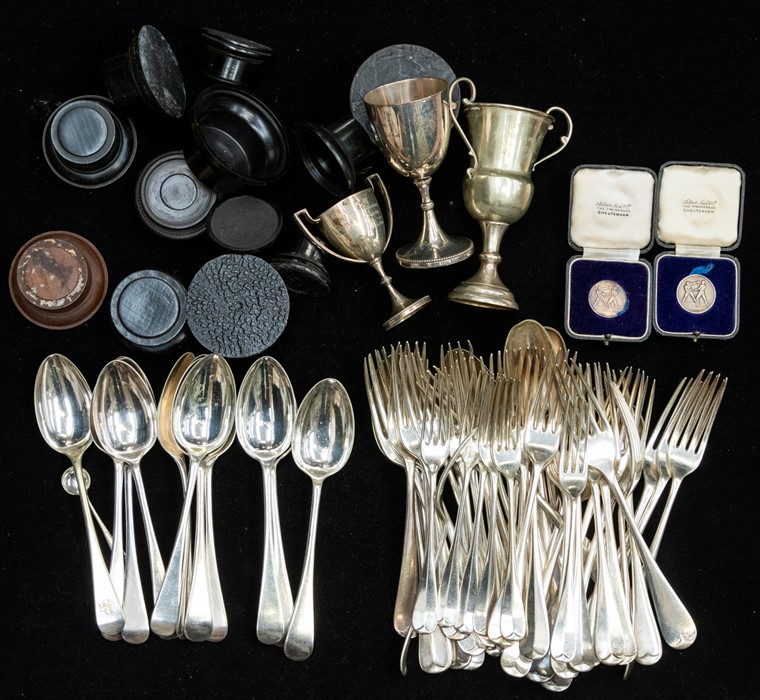 A collection of silver plate flatware to include Old English and Hanovarian pattern together with