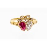 A Victorian double heart ring, comprising a claw set pear cut ruby and diamond with diamond set