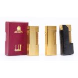 Three Dunhill cigarette lighters, 2nd half 20th Century, yellow metal and with engine-turned