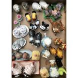 A collection of assorted ceramic table salts including Disney Rabbits, Cottages, Toucans,