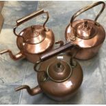 A large early 19th Century oversize copper Kettle and two further large kettles similar (3)