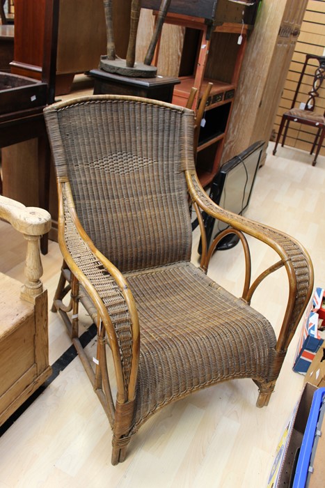 An early to mid 20th Century wicker armchair
