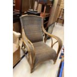 An early to mid 20th Century wicker armchair