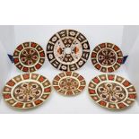 Two Royal Crown Derby 1128 Imari medium sized plates, along with three 1128 side plates CR all