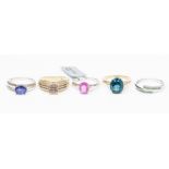 A collection of 9ct gold and gem set rings to include three white gold rings, a pink sapphire and