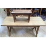 An Arts and Crafts style hand crafted oak coffee table, inscribed 'AL', measuring 43cm high, 102cm