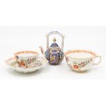A decorative Meissen cup and saucer, along with another cup in the 19th Century style, along with