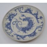 A Chinese blue and white dish, Twentieth Century, decorated in the Yuan style with wrythen dragons