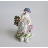 A Bow Figure of a Lady Flower Seller Date: circa 1760, marked Size: 7.5cm diameter, 12cm high