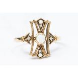 A 9ct gold opal and diamond dress ring, openwork design, set to the centre with a round opal, size