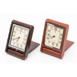 Two Jaeger-LeCoultre miniature travel clocks, with eight day calendar movements, one in dark brown