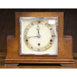 An Elliot Art Deco Oak Eight Day Mantle Clock having a silvered chapter dial and a 19th century